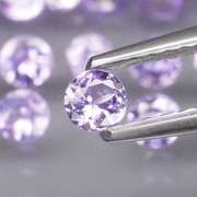 Heavy flashing 5.05ct diamond cut Tanzanite set