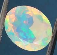 Excellent glittering 1.69ct faceted Jelly Opal