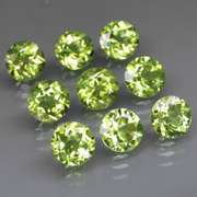 High grade 8.40ct untreated apple green Peridot set