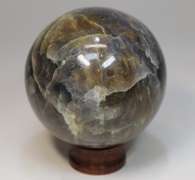 Amazing color! 1,776ct  galaxy patterned Iolite sphere