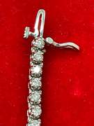 14K WHITE GOLD AND 4.00 CARATS OF DIAMONDS BRACELET.
