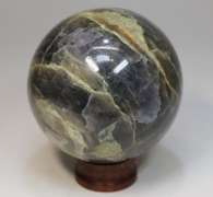 Amazing color! 1,776ct  galaxy patterned Iolite sphere
