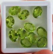 Glittering 11 piece Peridot set weighing 7.8cts