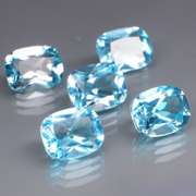 Large 16.95ct vivid blue cushion cut Topaz set