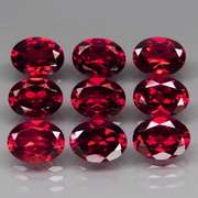 Premium 13.13ct oval cut cherry red Garnet set