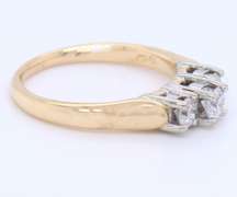Brilliant Yellow Gold Three Stone Diamond Band