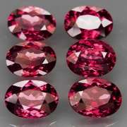 Remarkable 9.16ct violet pink Rhodolite Garnet set