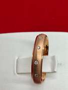 LADIES 14K ROSE GOLD AND DIAMOND BAND
