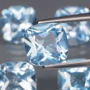 Large 12.25ct vivid blue cushion cut Topaz set