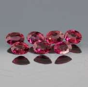 6.70ct premium cherry pink Rhodolite Garnet set