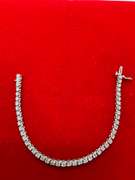 14K WHITE GOLD AND 4.00 CARATS OF DIAMONDS BRACELET.