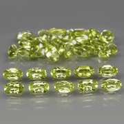 Dazzling 8.75ct untreated lime green Peridot set