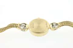 LADIES 14K GOLD AND DIAMOND SEIKO WATCH
