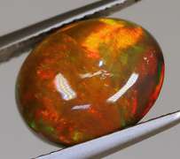 Magnificent 2.05ct full body flashing Black Opal