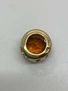 14K GOLD DIAMOND AND TOPAZ PENDANT.