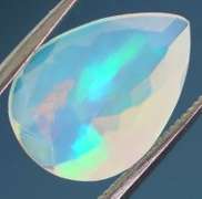 Tremendous glittering 1.69ct faceted Jelly Opal