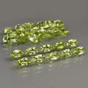 Dazzling 8.75ct untreated lime green Peridot set
