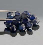 Captivating ink blue 7.80ct oval Sapphire set