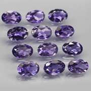 Gorgeous 4.46ct high luster blue violet Iolite set
