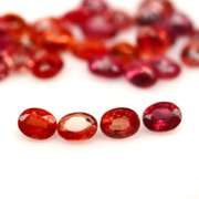 Excellent 7.19ct set of oval cut red Imperial Sapphires