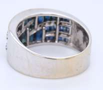 14KT WHITE GOLD BLUE SAPPHIRE & DIAMOND RING.