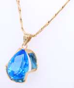 Gorgeous Yellow Gold Blue Topaz pendant on Chain