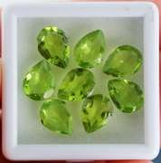 Pear cut 8 piece Peridot set weighing 7.50cts