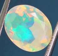 Excellent glittering 1.69ct faceted Jelly Opal