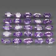 Heavy flashing 5.05ct oval cut Tanzanite set