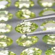 Dazzling 7.85ct untreated apple green Peridot set