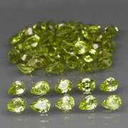Dazzling 8.22ct untreated apple green pear shaped Peridot set