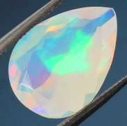Tremendous glittering 1.69ct faceted Jelly Opal