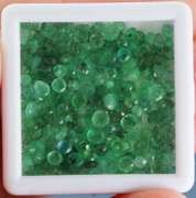 Tremendous 10.51ct set of Emeralds with multiple green hues