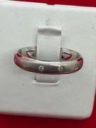 LADIES 14K WHITE GOLD AND DIAMOND BAND