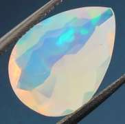 Tremendous glittering 1.69ct faceted Jelly Opal