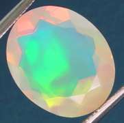 Tremendous glittering 2.51ct faceted Jelly Opal