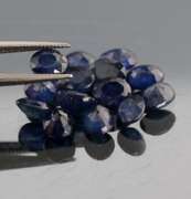 Captivating ink blue 7.80ct oval Sapphire set
