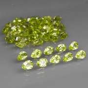 Fantastic 8.24ct 4x3mm pear cut Peridot set