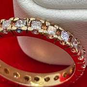 14K GOLD AND DIAMOND ETERNITY RING