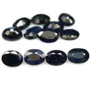 Heated only! 12.46ct dark blue Sapphire set from Madagascar