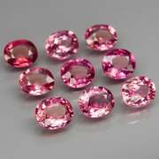 Remarkable 6.48ct violet pink Rhodolite Garnet set