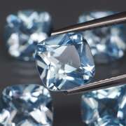 Large 12.57ct vivid blue cushion cut Topaz set