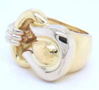 LADIES SOLID GOLD 18 KT RING.