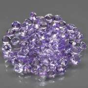 Heavy flashing 5.14ct diamond cut Tanzanite set