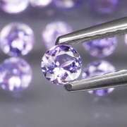 Glittering 4.91ct bright blue violet Tanzanite set