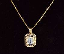 Tasteful Topaz Pendant Necklace in Yellow Gold
