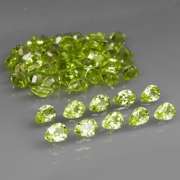 Dazzling 8.20ct untreated apple green Peridot set