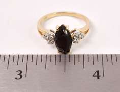 Amazing Black Gemstone and Diamond Ring in Yellow Gold