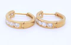 Charming Yellow Gold CZ Huggies Earrings