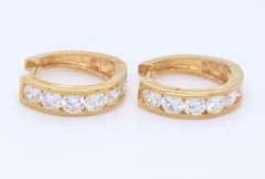 Charming Yellow Gold CZ Huggies Earrings
